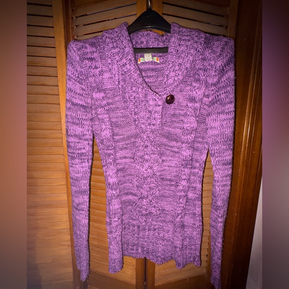 Purple sweater.